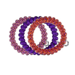 TELETIES - CLEMSON UNIVERSITY  On Gameday, hold your hair and enhance your style with TELETIES. The strong grip, no rip hair tie that doubles as a bracelet. Strong, pretty and stylish, TELETIES are designed to withstand everyday demands while taking your Gameday look to the next level.